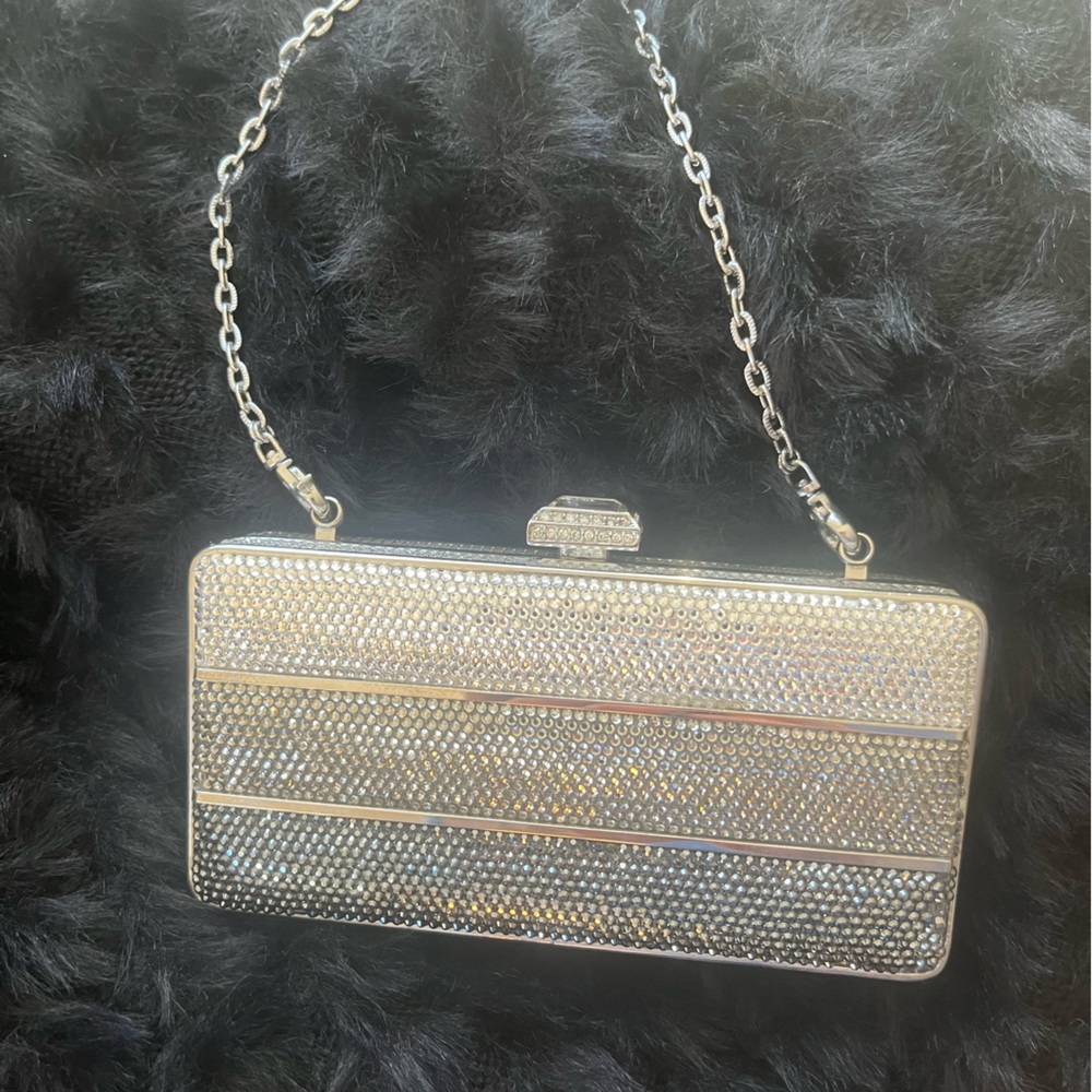Ultra glam Judith Lieber hinged mini clutch encrusted with crystals.